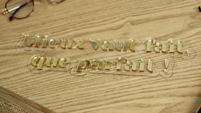 Enseigne &quot;Mieux vaut fait que parfait&quot;