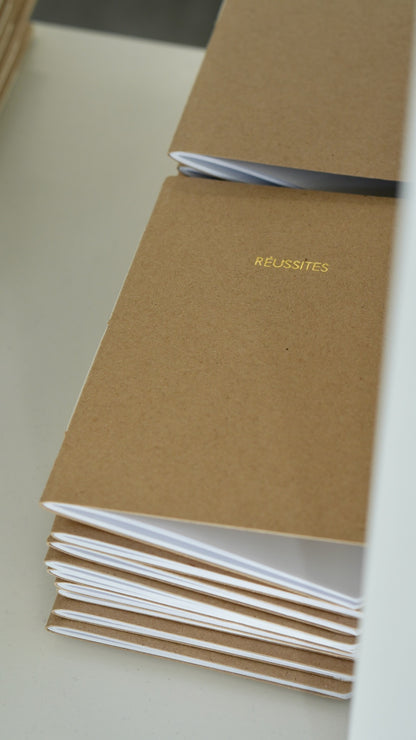 Livret &quot;Réussites&quot; relié à la main